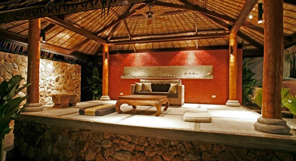Red lounge interior with stone wall, Siam