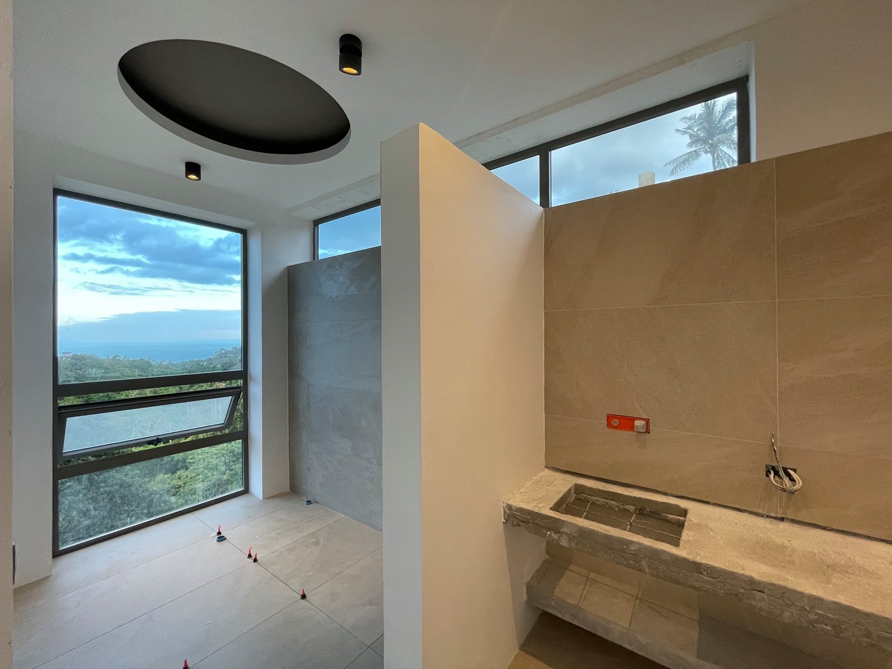 Bathroom under construction with hillside view, Ultra