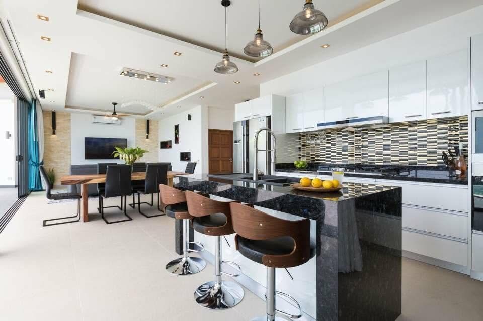 Modern kitchen with black stone island, Victoria
